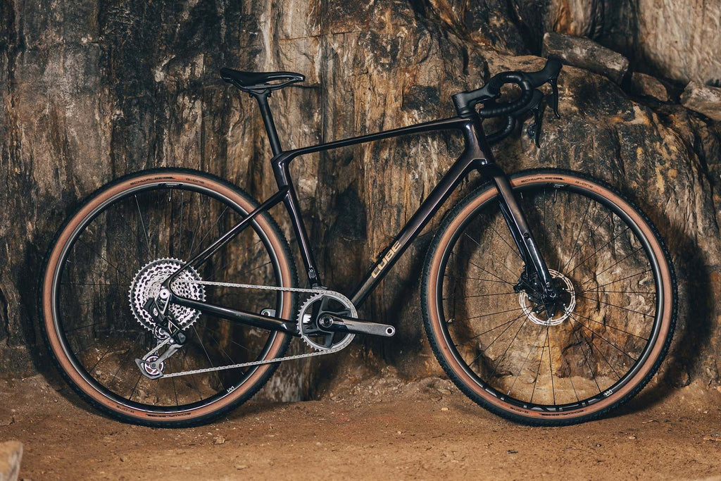 Vélo de Gravel Cube Nuroad C:62 SLX Sram Force eTap AXS/XX SL Eagle AXS 12V 700 mm Orange Violet Solareclipse 2025