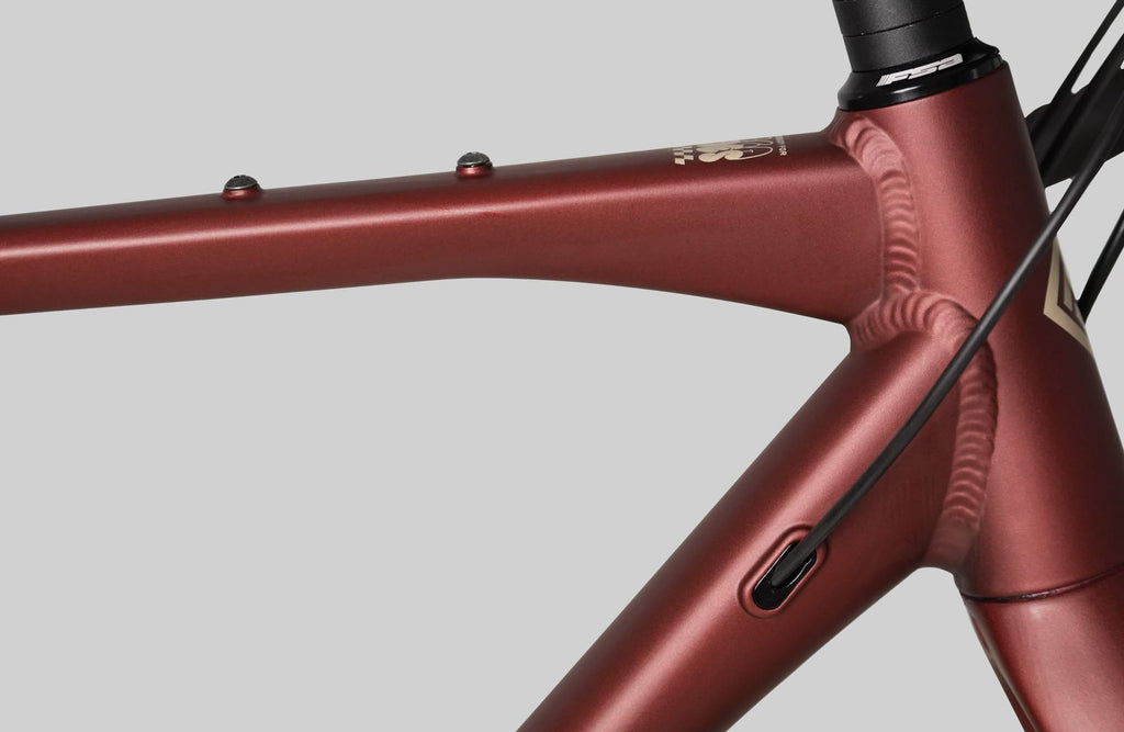 Vélo de Gravel Megamo Jakar 30 Shimano GRX 2x10V 700mm Garnet 2026