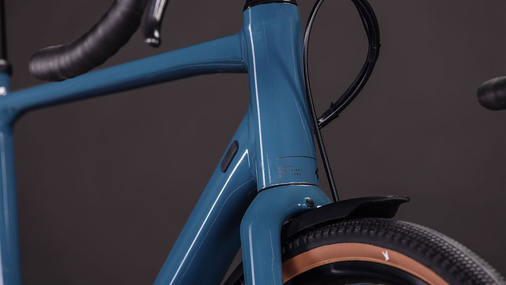Vélo de Gravel Cube Nuroad One FE Shimano Cues 9V 700 mm Bleu Vert Grove 2026