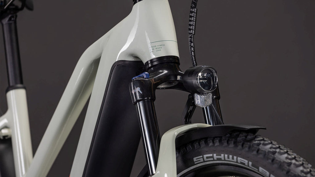 VTC Électrique Cube Nuride Hybrid Performance 600 Trapeze Shimano Cues 10V 600 Wh 29'' Beige Desert Stone Vert 2026
