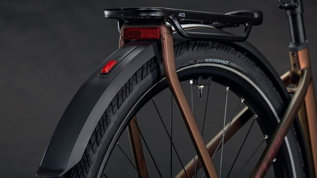 VTC Électrique Cube Kathmandu Hybrid Pro 800 Trapeze Shimano Deore/Deore XT 12V 800 Wh 700 mm Rouge Orange Sun Glow 2026
