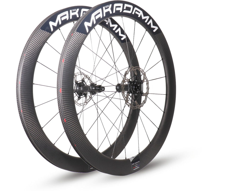 Paire de roues carbone route – MaKadamm evora 55 disc xpremium à pneus – 1345 gr la paire – centerlock – axe 12x100 | 12x142