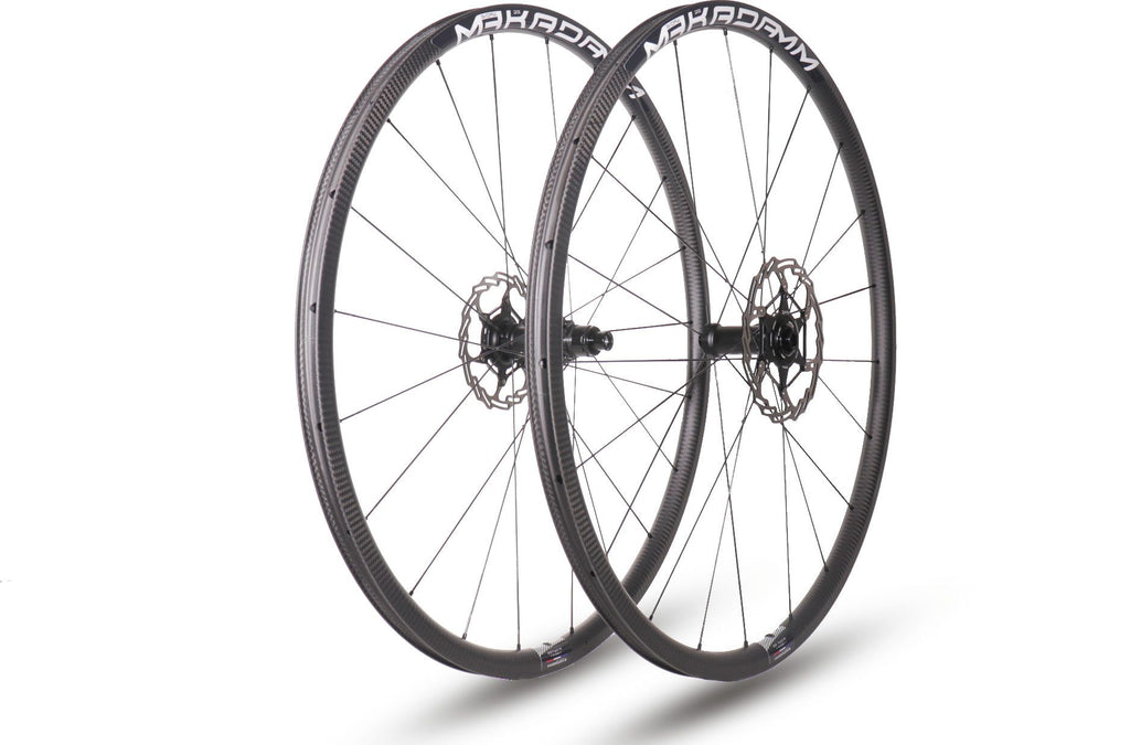 Paire de roues carbone route – MaKadamm evora 25 disc xpremium à pneus – 1130 gr la paire – centerlock – axe 12x100 | 12x142