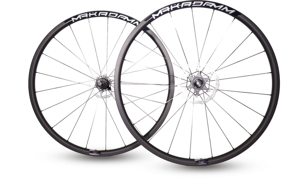 Paire de roues carbone route – MaKadamm evora 25 disc xpremium à pneus – 1130 gr la paire – centerlock – axe 12x100 | 12x142