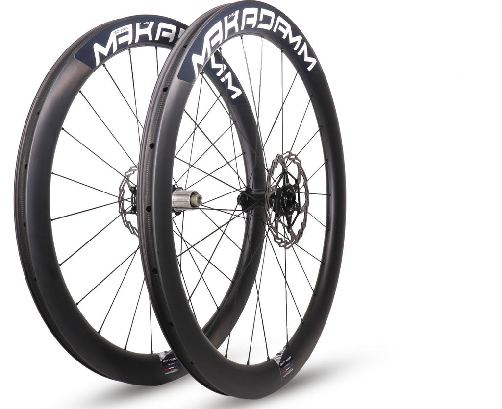 Paire de roues carbone route – MaKadamm stark u49 disc premium à pneus – 1377gr la paire – centerlock – axe 12x100 | 12x142