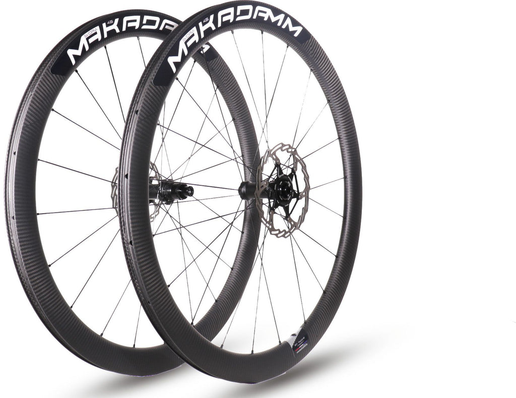 Paire de roues carbone route – MaKadamm evora 45 disc xpremium à pneus – 1265 gr la paire – centerlock – axe 12x100 | 12x142