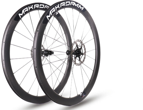 Paire de roues carbone route – MaKadamm evora 45 disc xpremium à pneus – 1265 gr la paire – centerlock – axe 12x100 | 12x142