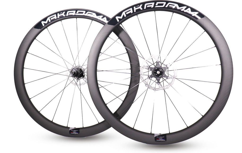 Paire de roues carbone route – MaKadamm evora 45 disc xpremium à pneus – 1265 gr la paire – centerlock – axe 12x100 | 12x142