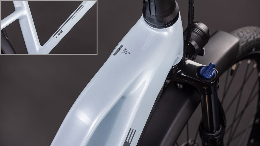 VTC Électrique Cube Touring Hybrid One 600 Trapeze Shimano Cues 9V 600 Wh 700 mm Bleu Glacier 2026
