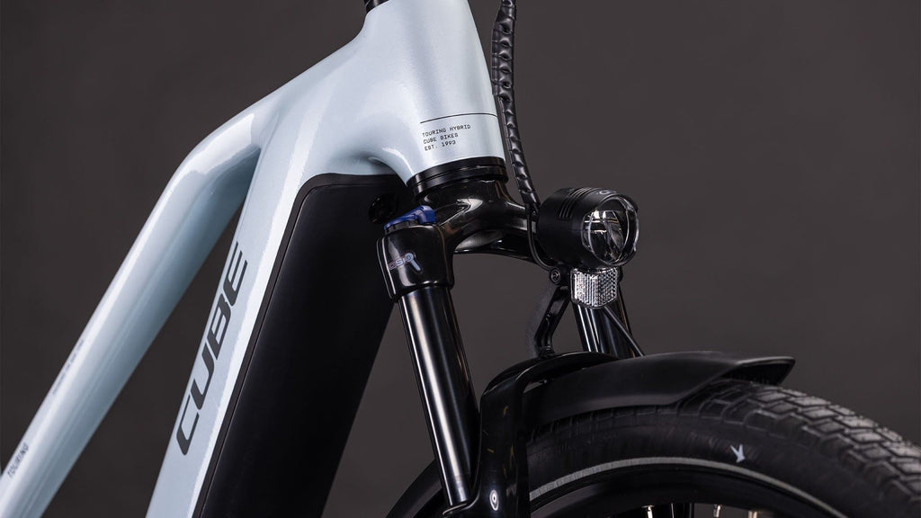 VTC Électrique Cube Touring Hybrid One 600 Trapeze Shimano Cues 9V 600 Wh 700 mm Bleu Glacier 2026