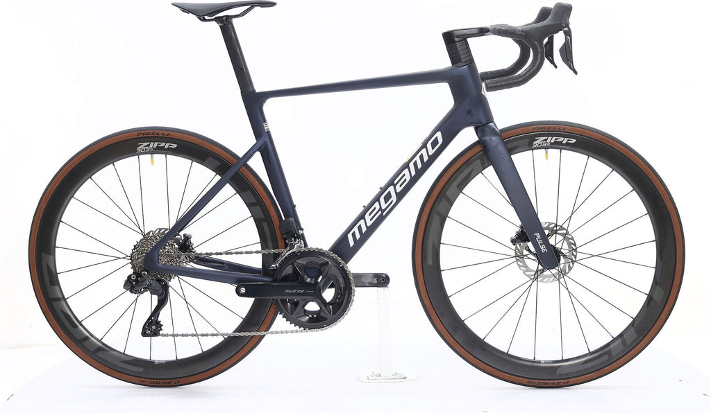 Produit Reconditionné · Vélo de route MEGAMO Pulse 15 CW 2026 · Très bon état